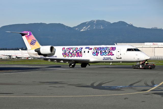 Canadair Regional Jet CRJ-200 (N92EA) - Chartered by the Little Steven and special livery