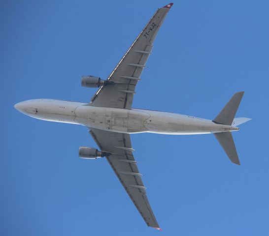 Airbus A330-200 (7T-VJZ) - Taken from outside of Hatton Cross tube station