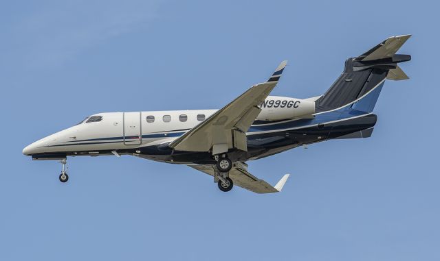 Embraer Phenom 300 (N999GC) - Runway 20R arrival @KDPA.