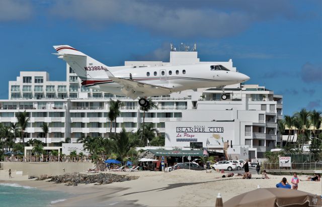 Hawker 800 (N3386A) - Hawker N3386A over the beach at St Maarten.