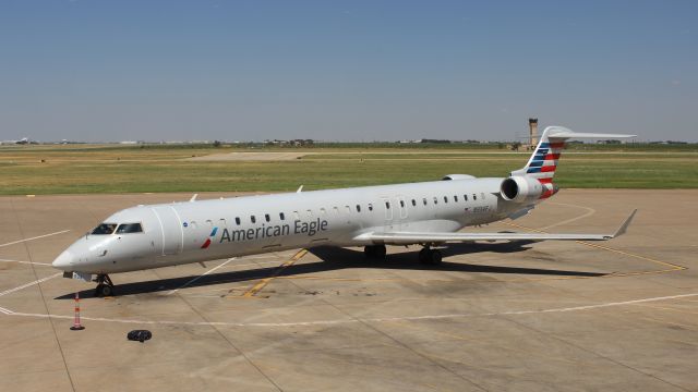 Canadair Regional Jet CRJ-900 (N934FJ) - As seen from the terminal on 9/03/2019.