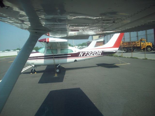 Cessna Centurion (N732DR) - Cessna 210 parked next to us at Queen City