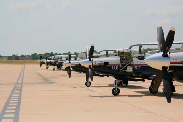 North American T-6 Texan — - The 8 ballers dominate the ramp at KFSM today, good to see them back after their recent strike.