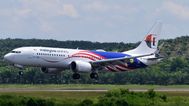 9M-MVD — - Arriving from its BFI-HNL-GUM-KUL delivery flight at runway 32L.