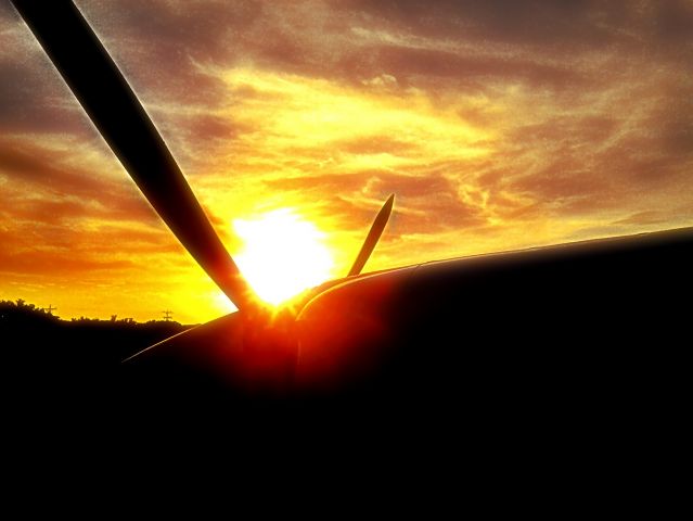 Cessna Skylane (N528KC) - 2002 C182T Registered to a James Elson in Bellville, Texas. Props catching some rays before the sunset.