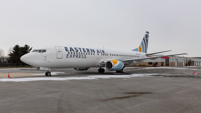 BOEING 737-400 (N314XA) - A Boeing 737-400 sits on the ramp at Corporate Wings.