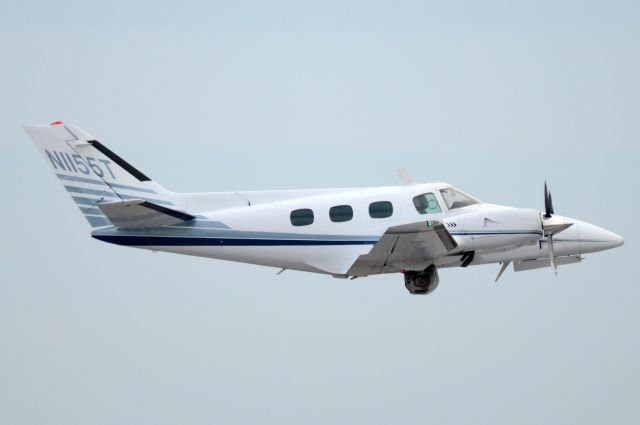 Beechcraft Duke (N1155T) - Photo by Frederick K. Larkin - Toronto. Shown departing for Erie, PA.