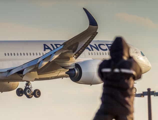 Airbus A350-900 (F-HTYA) - Fellow spotter getting in on the Air France action at runway 23