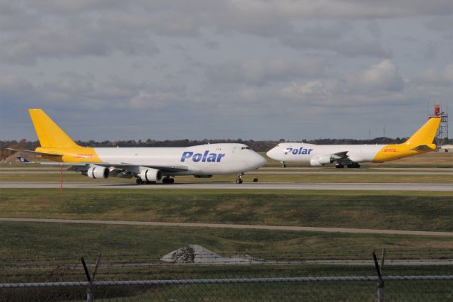 Boeing 747-400 (N453PA) - with company sister ship B-747-8F N857GT on the right side of the picture.