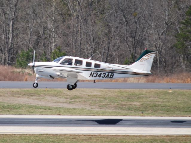 Beechcraft Bonanza (36) (N343AB) - GODLEY INDUSTRIES LLC departing runway 20 at KJQF - 3/14/14