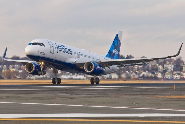 Airbus A320 (N828JB) - JetBlue A320 landing 22L with Sharklets -Simon Says Fly JetBlue @ KBOS Logan Airport on FlightAware.Com !