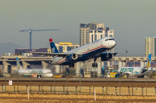 Airbus A321 (N578UW) - An American Airlines A321 in US Airways retro livery taking off from PHX on 1/25/23. Taken with a Canon R7 and Tamron 70-200 G2 lens.