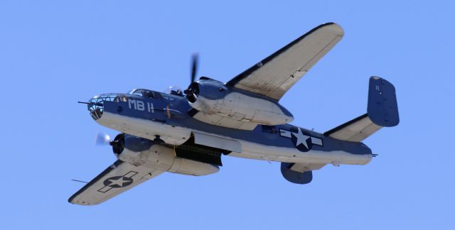 North American TB-25 Mitchell (N5865V) - "Semper Fi," the Commemorative Air Force's PBJ-1 (B-25) Mitchell bomber, makes a low pass with the bomb bay doors open during Travis AFB's "Wings Over Solano 2022" Open House and Air Show event.