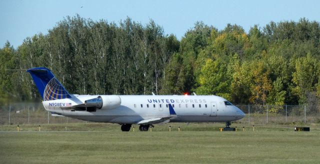 Canadair Regional Jet CRJ-200 (N908EV) - Taxiing for departure is this 2002 United Express Canadair Regional Jet 200ER from late Summer of 2021.