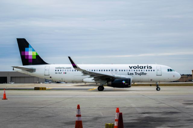 Airbus A320 (XA-VLP) - Volaris A320 taxiing to Runway 4 bound for MEX.