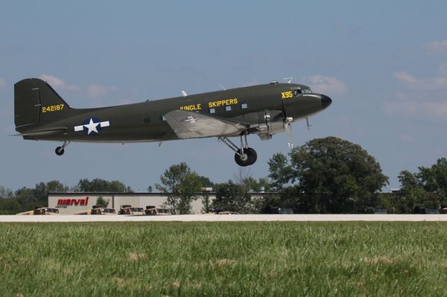 — — - DC-3 landing at Airventure in Oshkosh,WI