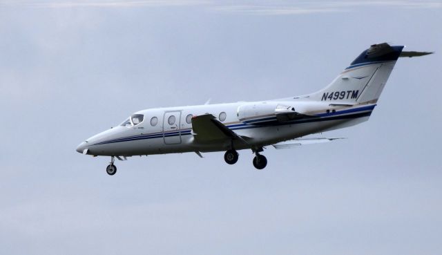 Beechcraft Beechjet (N499TM) - On final is this 2010 Hawker Beechcraft Beechjet 400A in the Autumn of 2019.