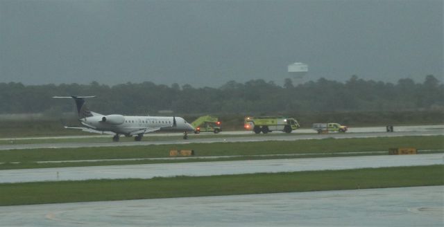 Embraer ERJ-145 (N13988) - HFD ARFF response waits for inbound E-145 to clear Rwy 8R