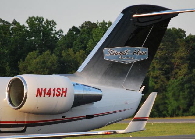 Canadair Regional Jet CRJ-200 (N141SH) - STEWART-HAAS RACING LLC at KJQF - 6/1/14