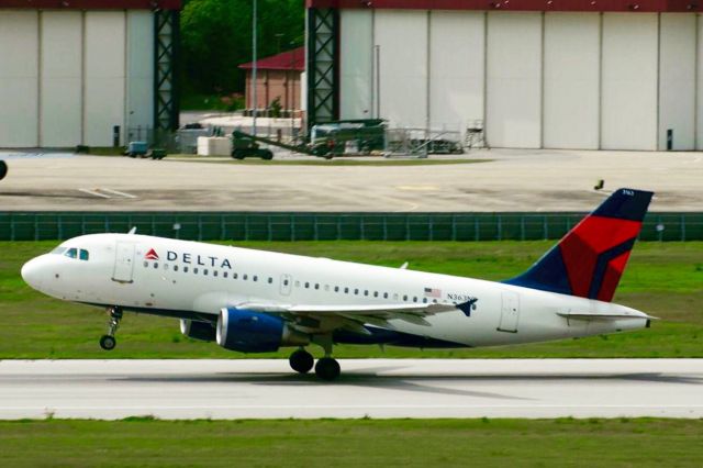 Airbus A319 (N363NB) - Deltas A319 rotates off of runway 24 at Birmingham flying to Atlanta just before some rain gets in. 