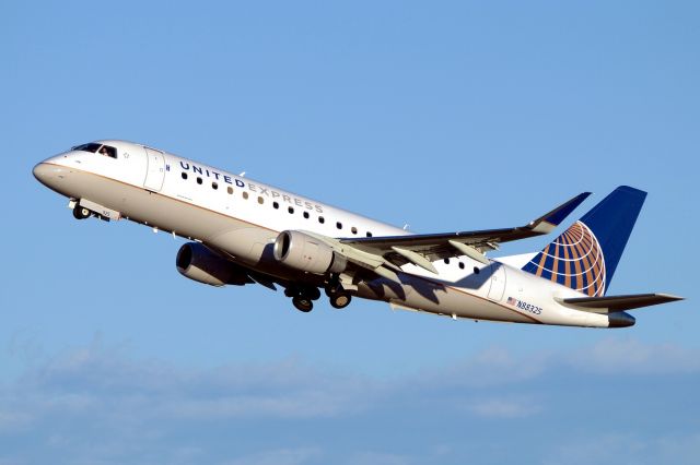 Embraer 170/175 (N88325) - 30L departure at sunset.