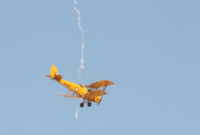 VH-UVZ — - Tiger Moth cutting the ribbon at the opening of the Warbirds Downunder at Temora NSW Australia 2/11/13