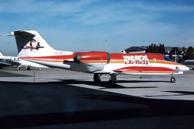 VH-WFJ — - WARDS EXPRESS - GATES LEARJET 35A - REG : VH-WFJ (CN 35A/242) - KINGSFORD SMITH SYDNEY NSW. AUSTRALIA - YSSY 27/6/1988 35MM SLIDE CONVERSION USING A LIGHTBOX AND A NIKON L810 DIGITAL CAMERA IN THE MACRO MODE.