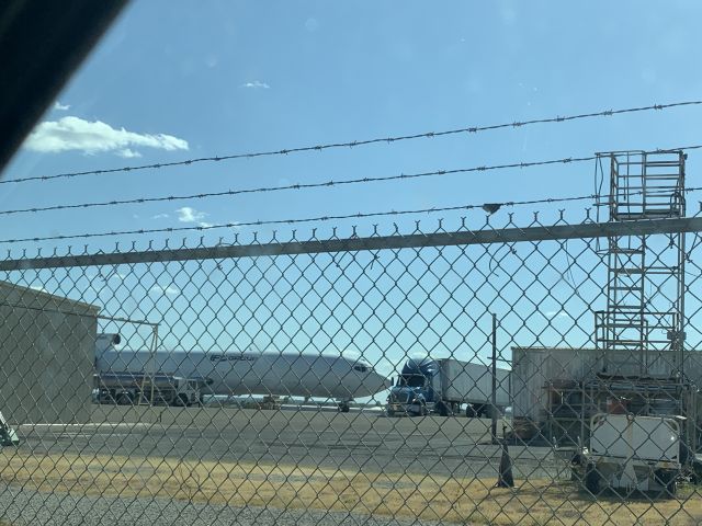 BOEING 727-200 (N216WE) - This IFL group Boeing 727-200 was loading up with cargo most likely auto parts from a Maquiladora in Acuña. This was taken about 45 prior to departure for its 2hr 40min trip to Oakland County,MI