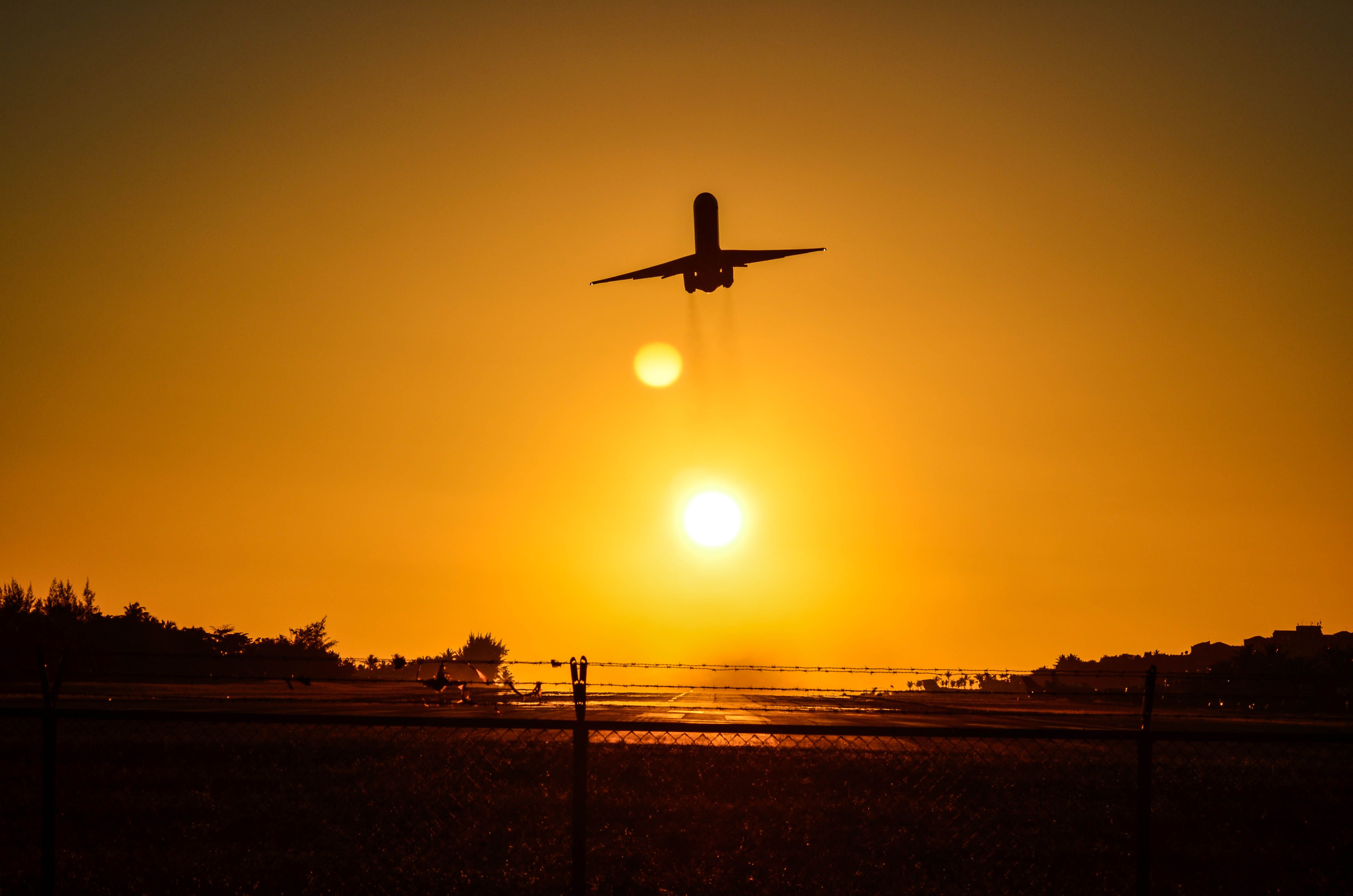 McDonnell Douglas MD-80 — - DAE taking off Runway 10, leaving the beautiful sun behind