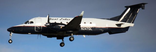 Beechcraft 1900 (N247GL) - Landing on 35L.