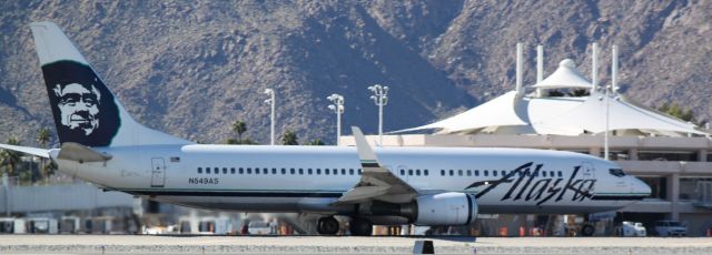 Boeing 737-800 (N549AS) - On the roll for take-off 31L on 01/22/2011