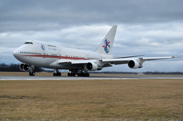 BOEING 747SP (P4-FSH) - Taking off runway 23