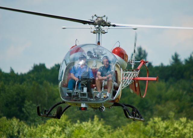 UNK — - Taking a lesson in a home-built chopper.