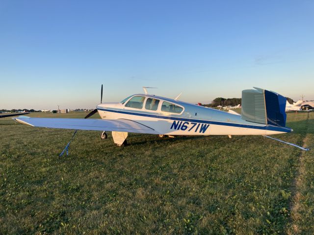 Beechcraft 35 Bonanza (N1671W) - Parked at Oshkosh during AirVenture at South 40.