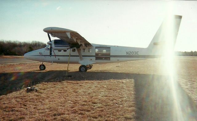 De Havilland Canada Twin Otter (N203E) - Super Duper Otter on the grass at Orange.  Arrived for Jumptowns      Thanksgiving Boogie (2001).  