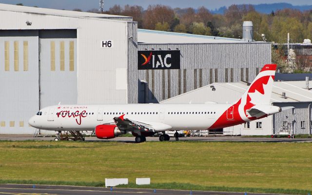 Airbus A321 (C-FYXF) - air canada rouge a321-211 c-fyxf after paint by iac in shannon 30/4/18.