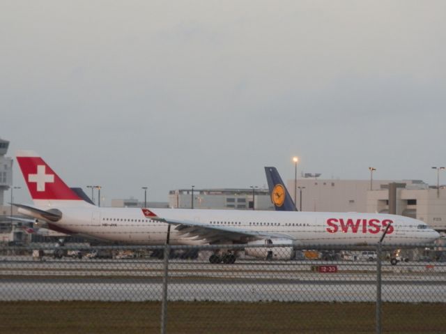 Airbus A330-300 (HB-JHK) - Coasting to a stop.Reverser doors just beginning to close!