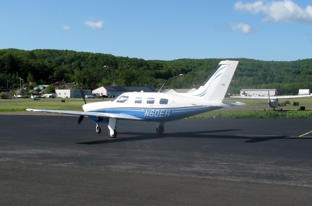 Piper Malibu Mirage (N60ER) - At the RELIANT AIR ramp, where you find the lowest fuel price on the Danbury (KDXR) airport.