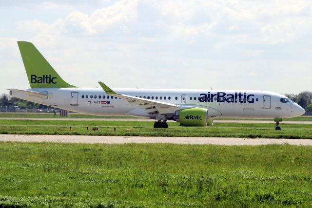 Airbus A220-300 (YL-AAT) - Taxiing to depart rwy 09R on 29-Apr-23 operating Eurowings flight EWG9467 to EDDL.