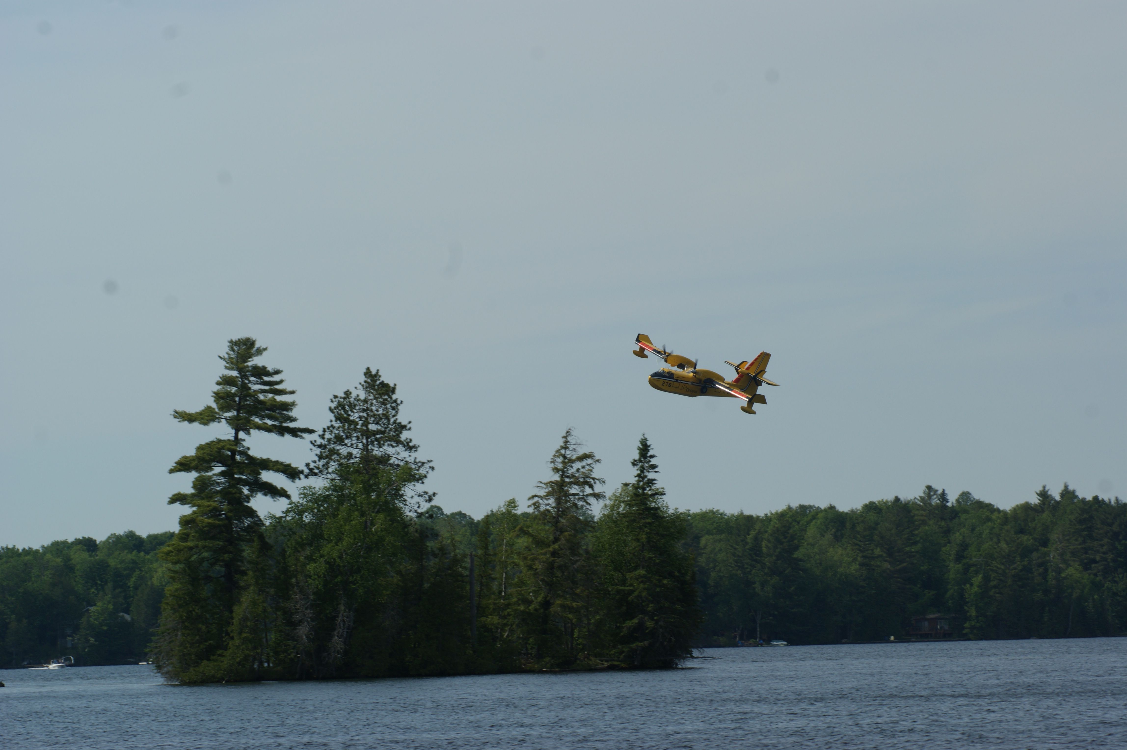 Canadair CL-41 Tutor (C-GOGX) - Crystal Lake, Ontario taken from our dock we had an awesome view as two SuperScoopers fought a nearby forest fire we could not see.