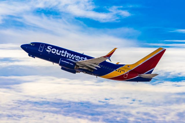 Boeing 737-700 (N944WN) - Southwest Airlines 737-700 taking off from PHX on 11/28/22. Taken with a Canon 850D and Tamron 70-200 G2 lens.