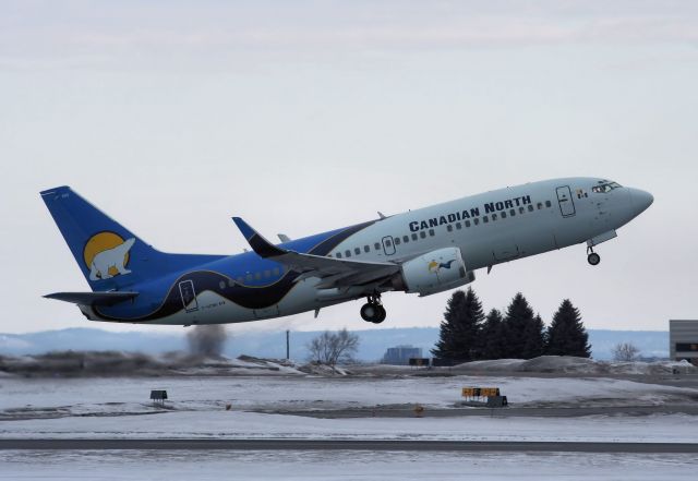BOEING 737-300 (C-GCNU) - Early morning takeoff in heavy overcast bound for Ft. Lauderdale. on 08-Mar-14.