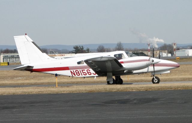 Piper Seneca (N8156J) - I was watching the airport activity and this guy taxied by so I shot the pic through the fence.