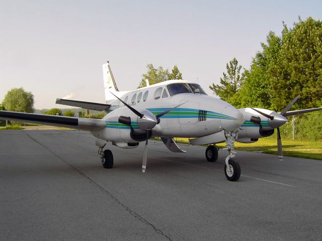 Beechcraft King Air 90 (D-IKES) - Resting at the apron and waiting for the passengers before the flight to salzburg airport.