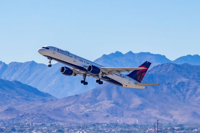 Boeing 757-200 (N662DN) - Delta Airlines 757-200 taking off from PHX on 11/6/22. Taken with a Canon 850D and Tamron 70-200 G2 lens.