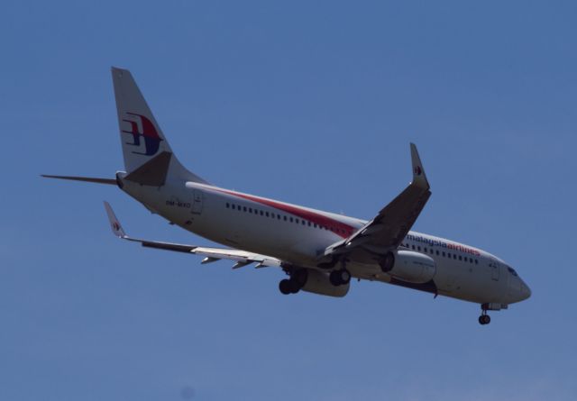 Boeing 737-700 (9M-MXO) - 5°20’13”N  115°13’03”E