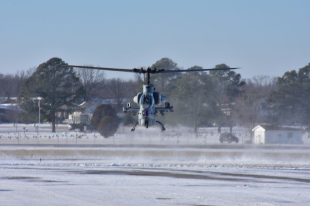 DEBORDE-ROLLAND Cobra — - A AH-1 Cobra kicking up some snow