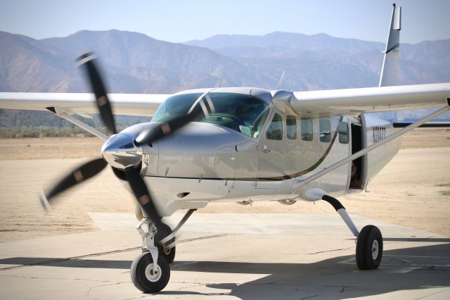 Cessna Caravan (N208ZZ) - Caravan picking up a new load of skydivers. The sound of this engine and prop gives me chills