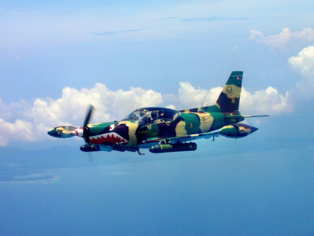 PAF16 — - SF260TPW over Mindanao 2002. pilot Gen. JC Nano