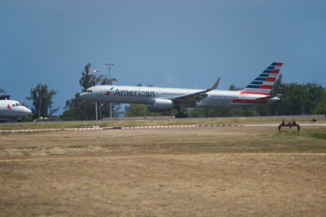 Boeing 757-200 — - American 757 touching down on runway 8L at PHNL.